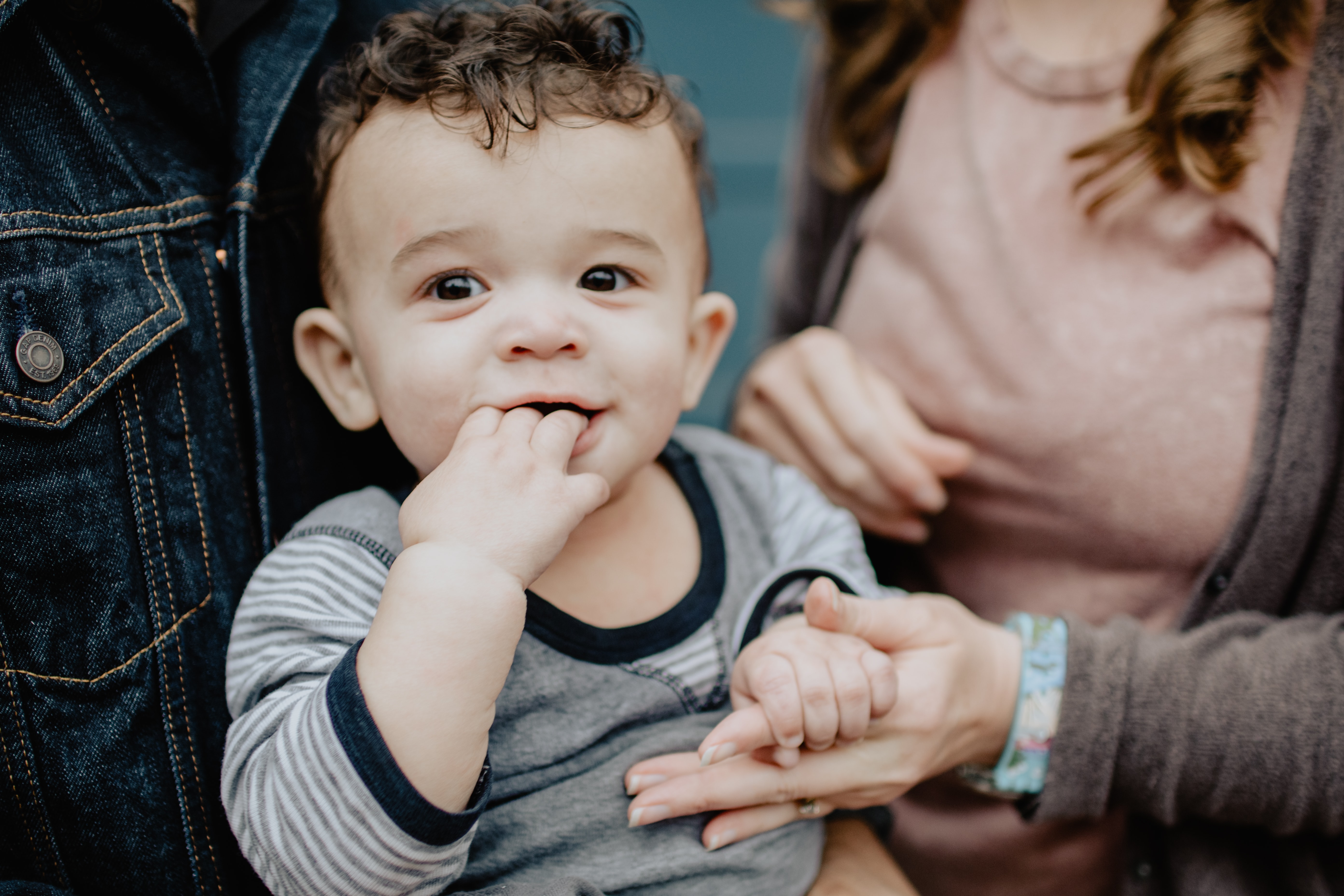 toddler with mom and dad